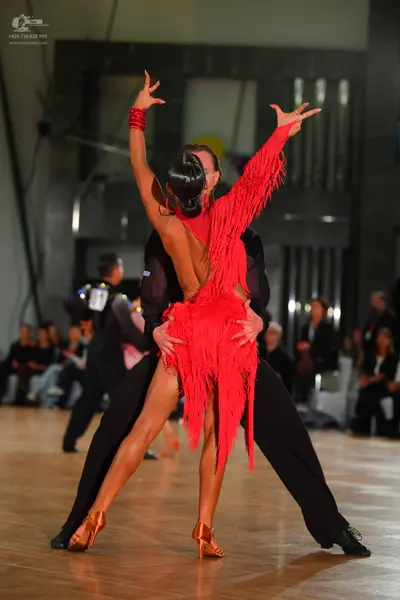 Dancesport competitor: Male dancer: black suit