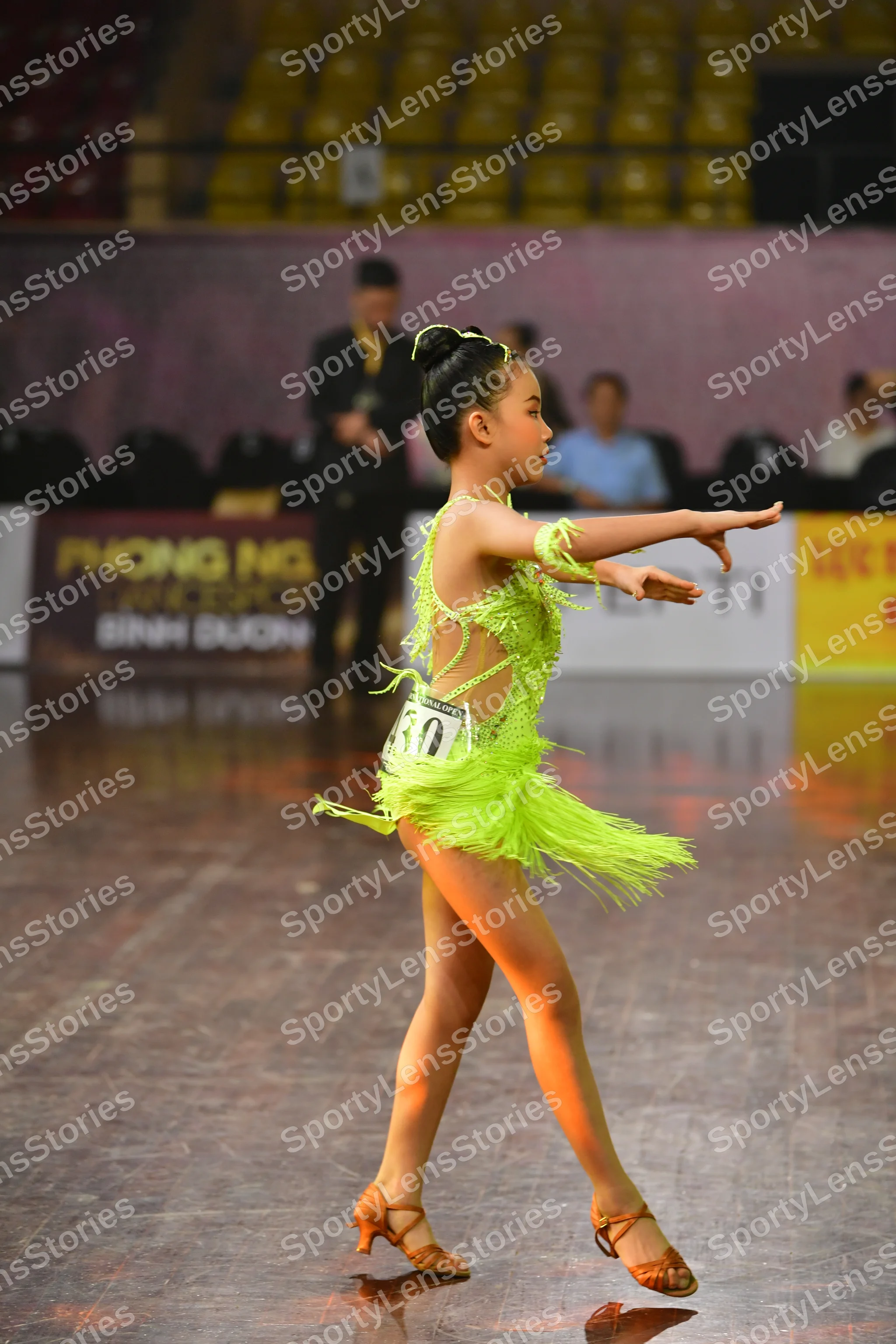 Dancesport competitor #101: Female dancer: lime green Latin dress with fringe