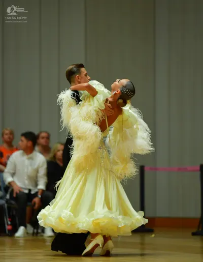 Dancesport competitor: Male dancer: black suit