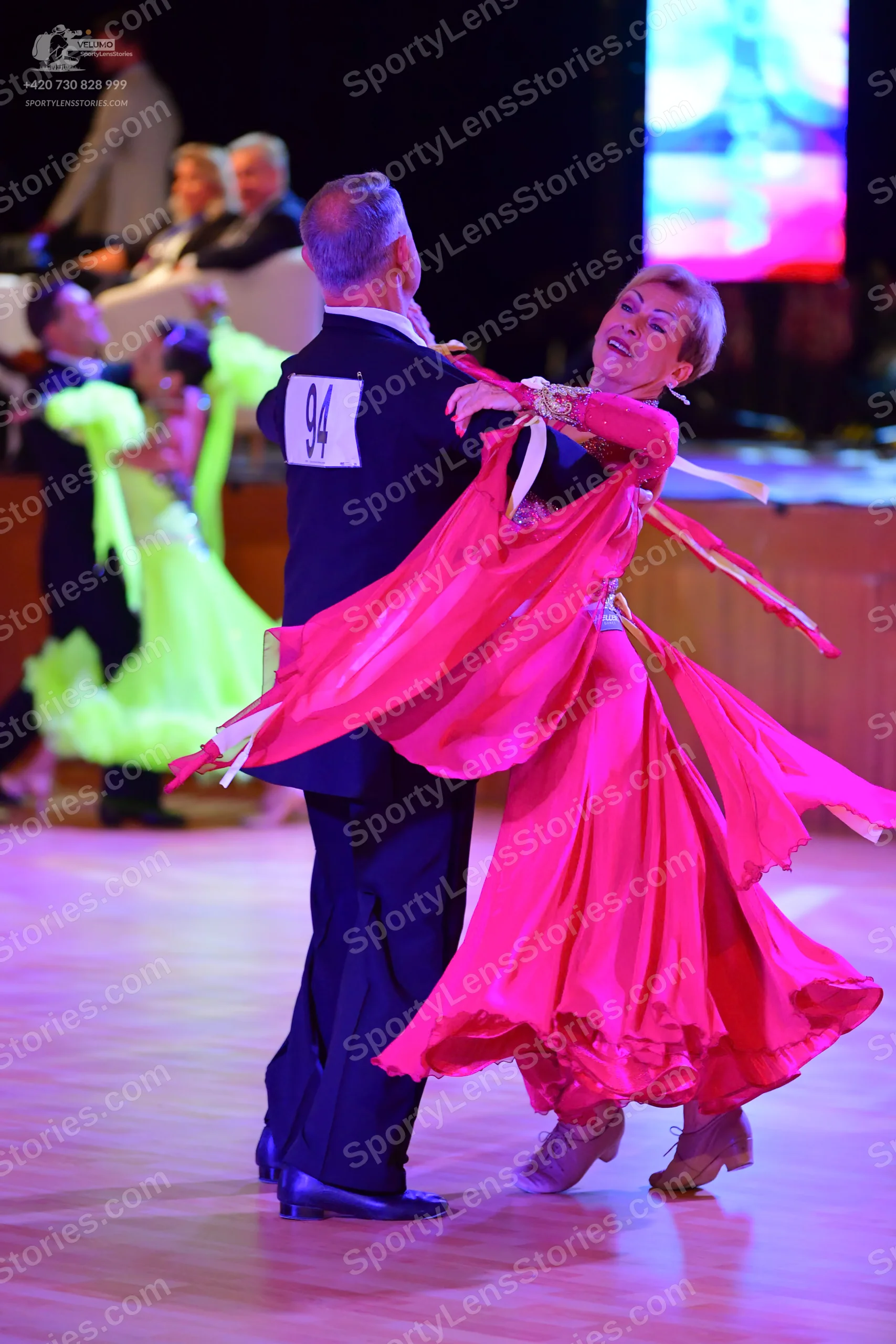 Dancesport competitor: ** Red Latin Dress
*   **Fabric:** Satin
*   **Style:** Latin Dress - Fitted bod