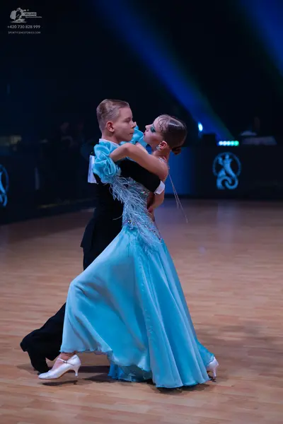 Dancesport competitor: Male dancer: black ballroom suit