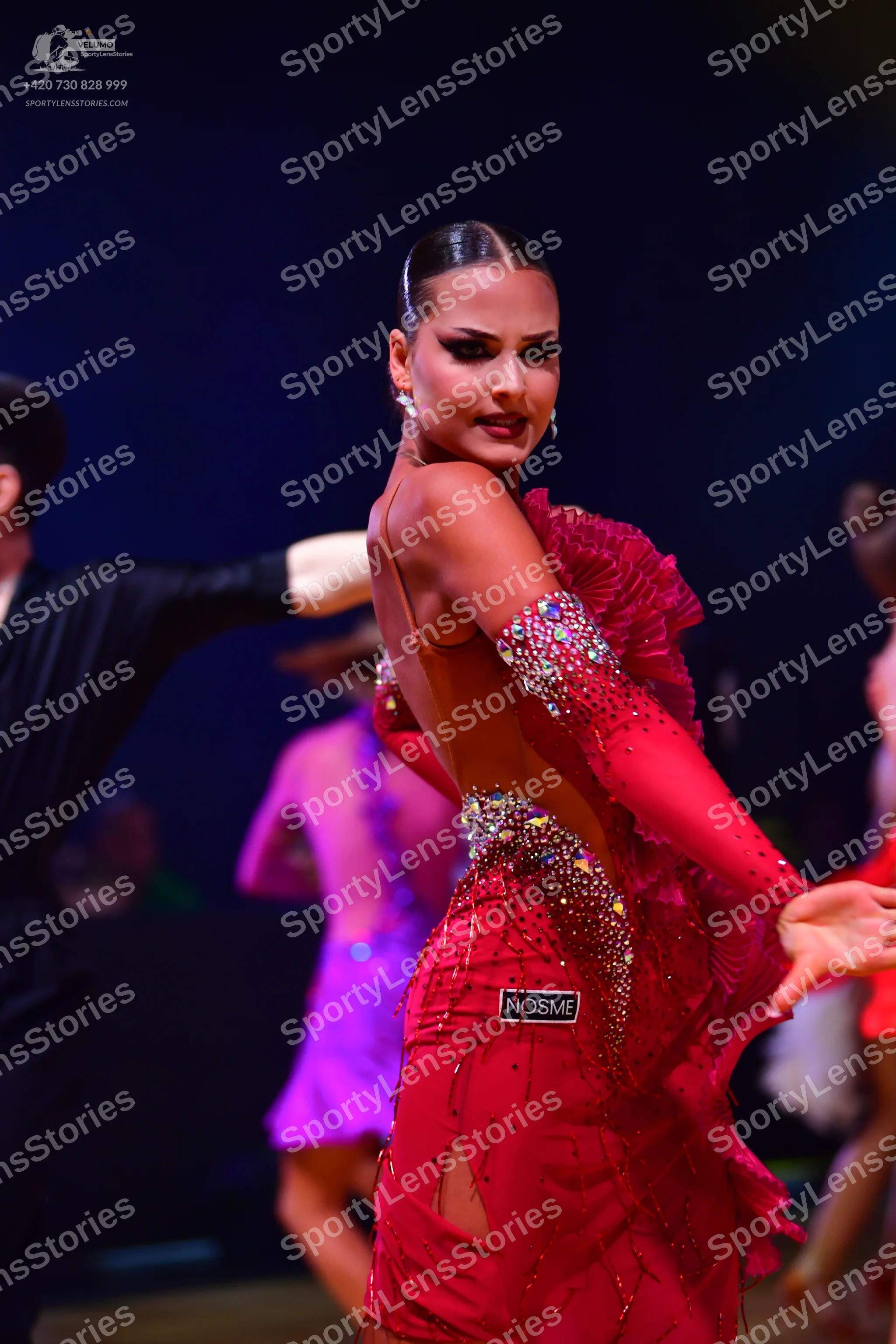 Dancesport competitor: Male dancer: black suit