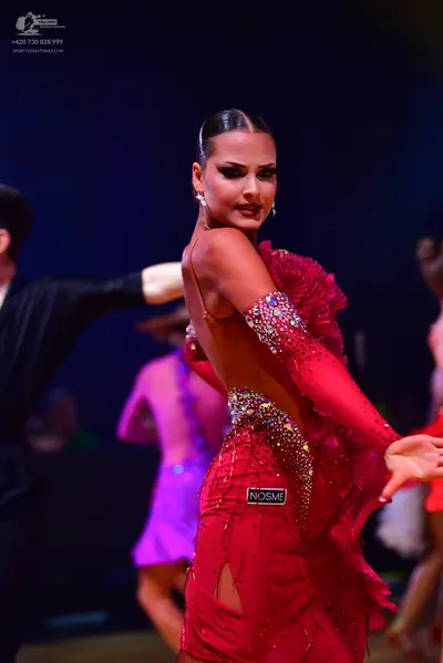Dancesport competitor: Male dancer: black suit