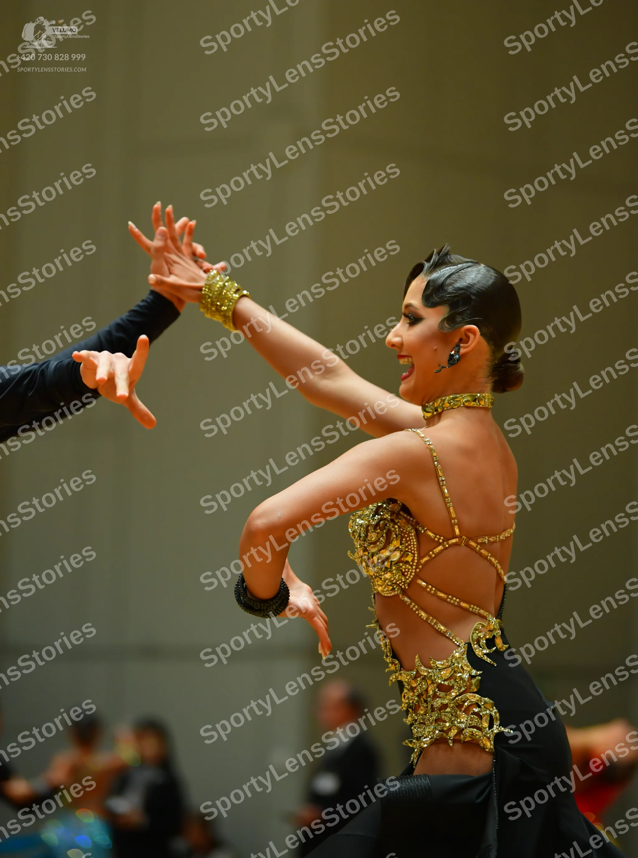Dancesport competitor: Male dancer: Black long-sleeved shirt or suit jacket