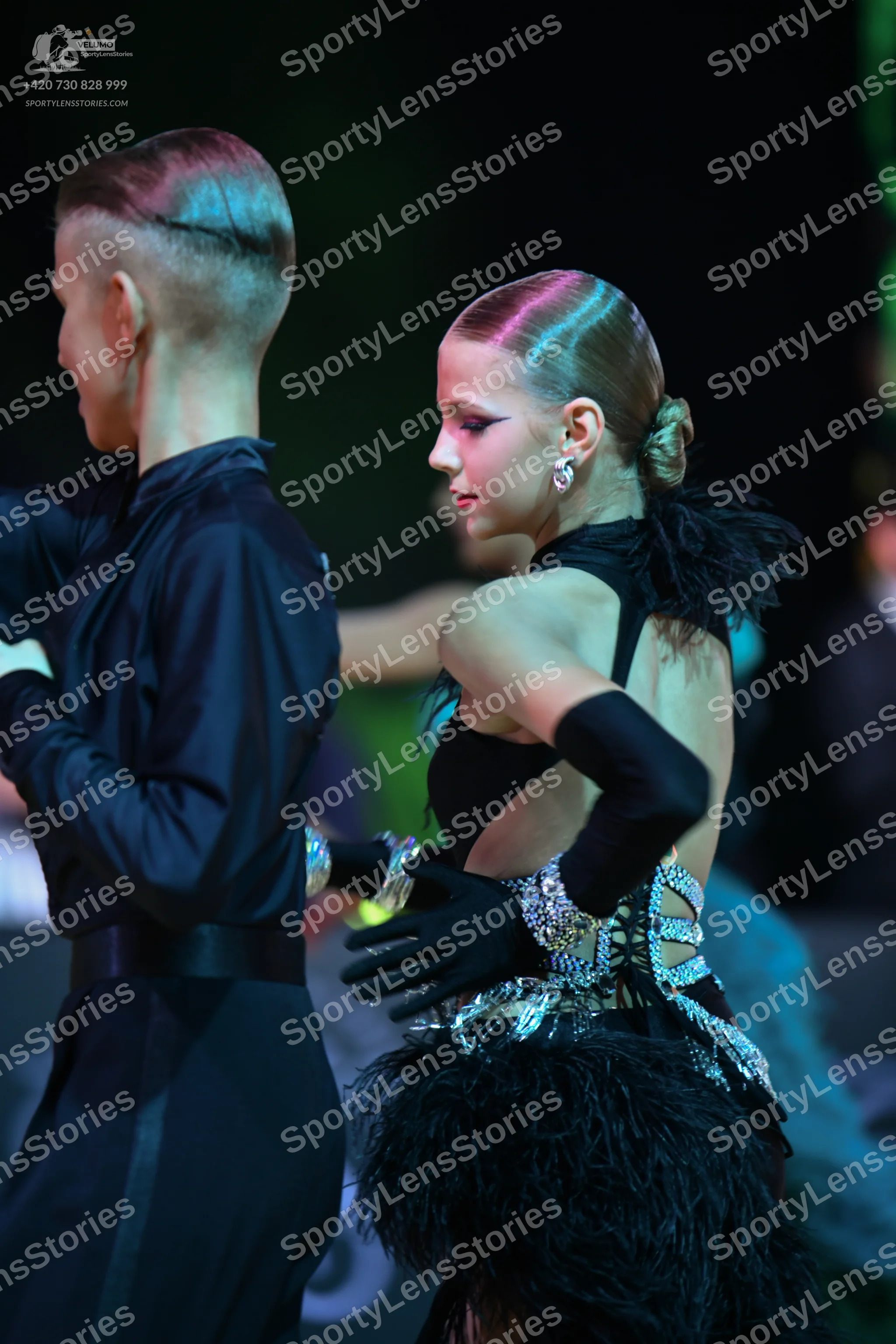 Dancesport competitor: Male dancer: black long-sleeved dance top