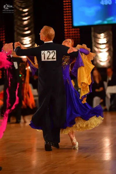 Dancesport competitor #122: Male dancer: dark blue suit