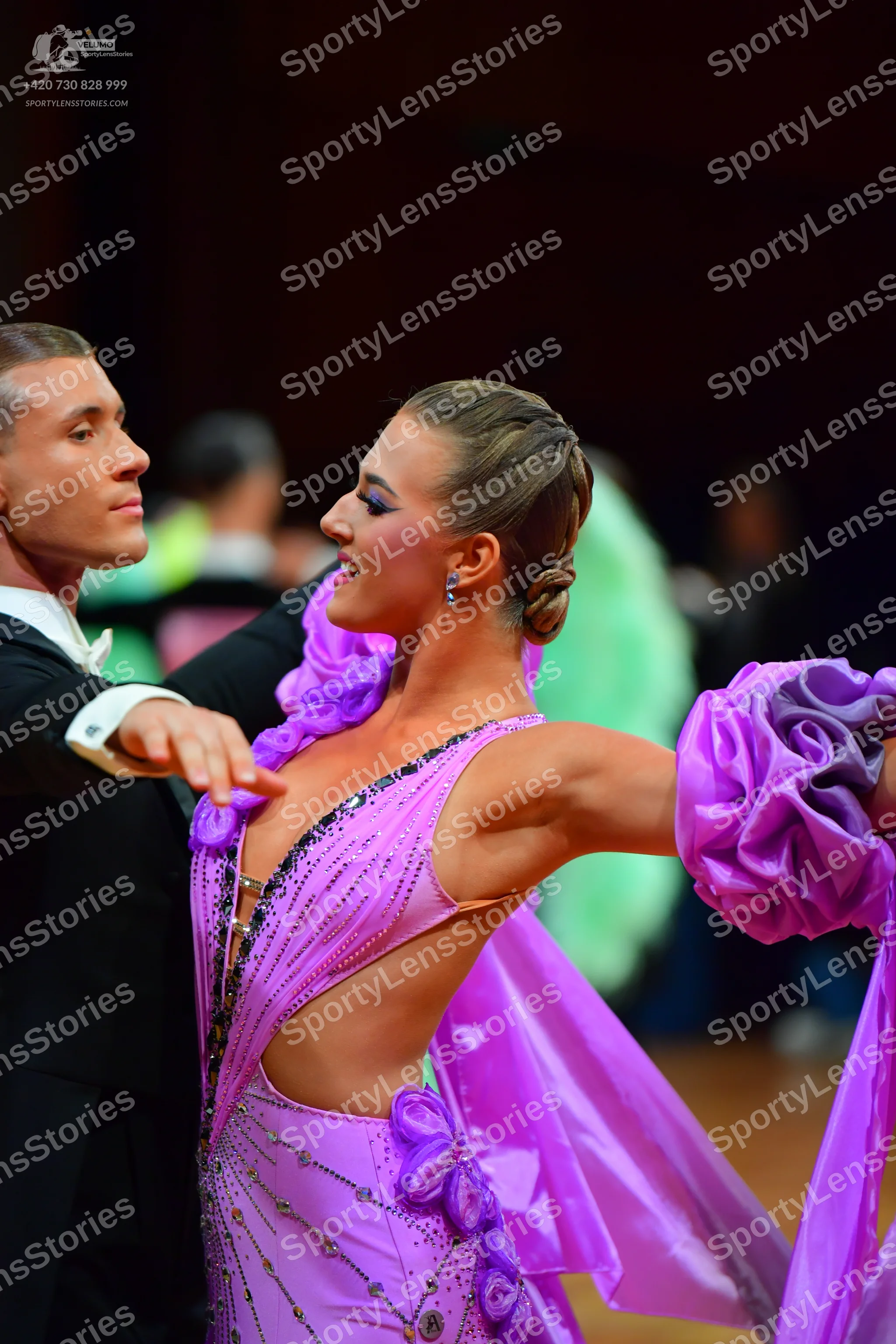 Dancesport competitor: Male dancer: black suit with a white shirt