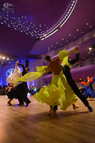 Dancesport competitor: Male dancer: black suit