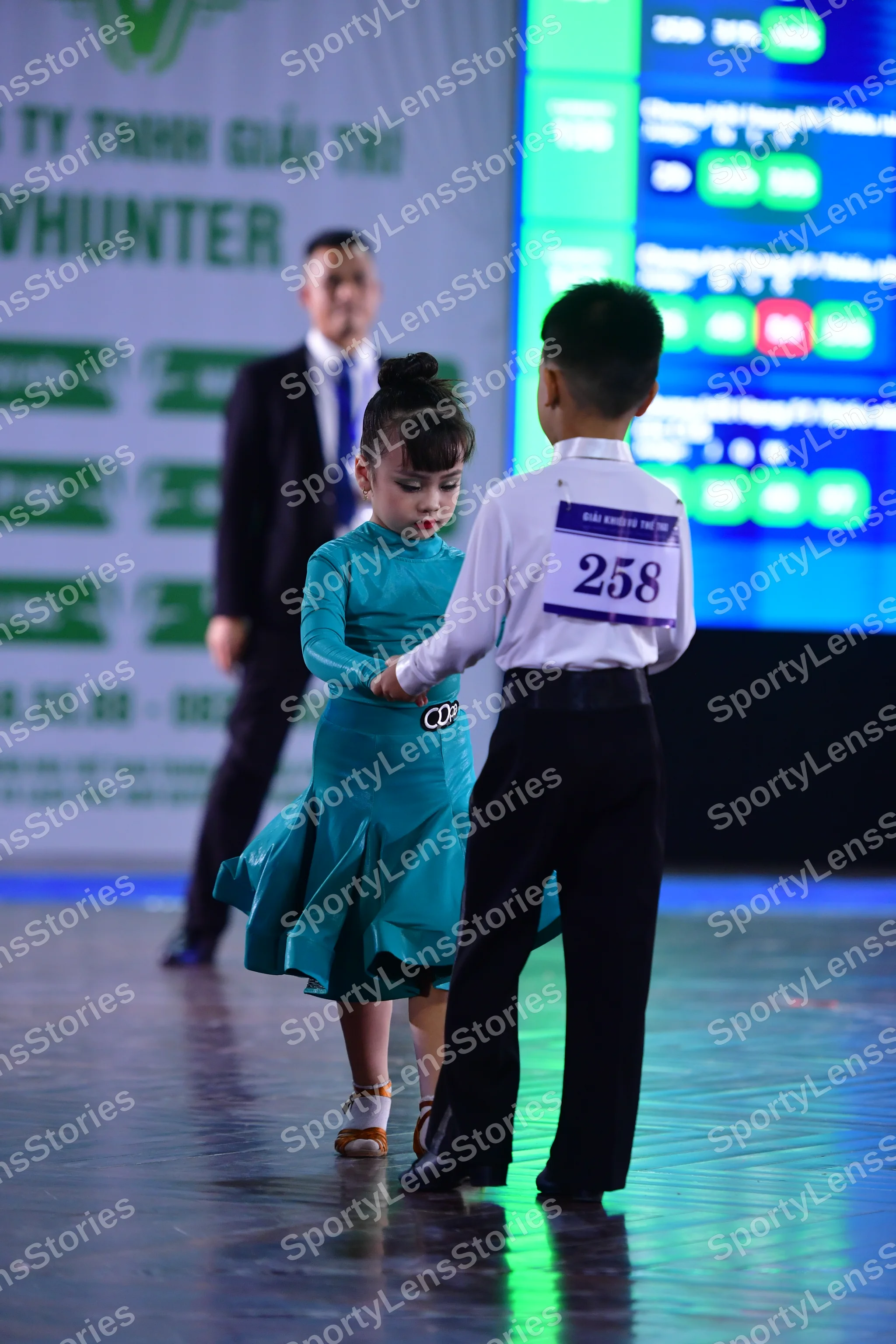 Dancesport competitor: ** Male: Black tail suit with silver sequin lapels