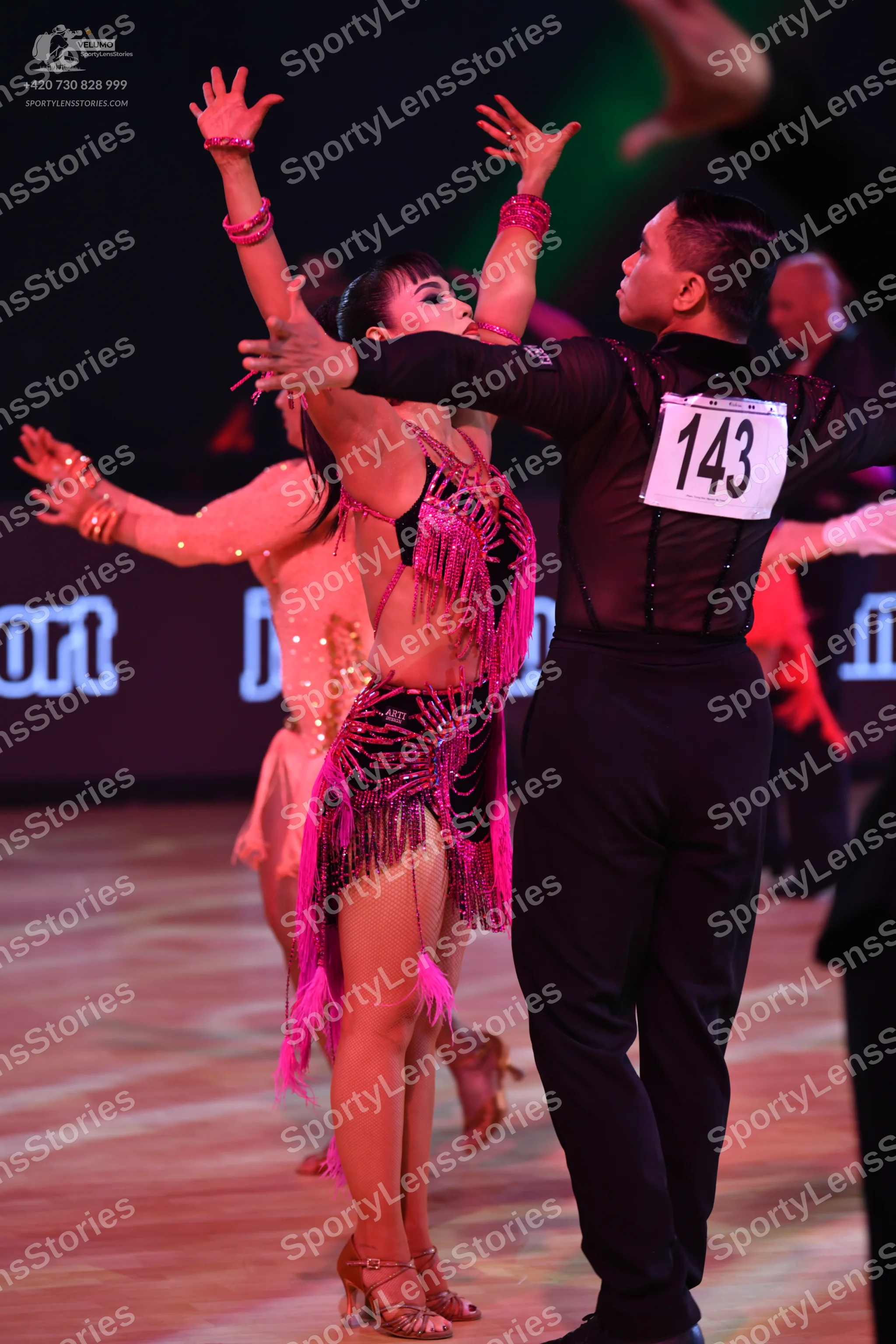 Dancesport competitor: Male dancer: black long-sleeved shirt and black trousers