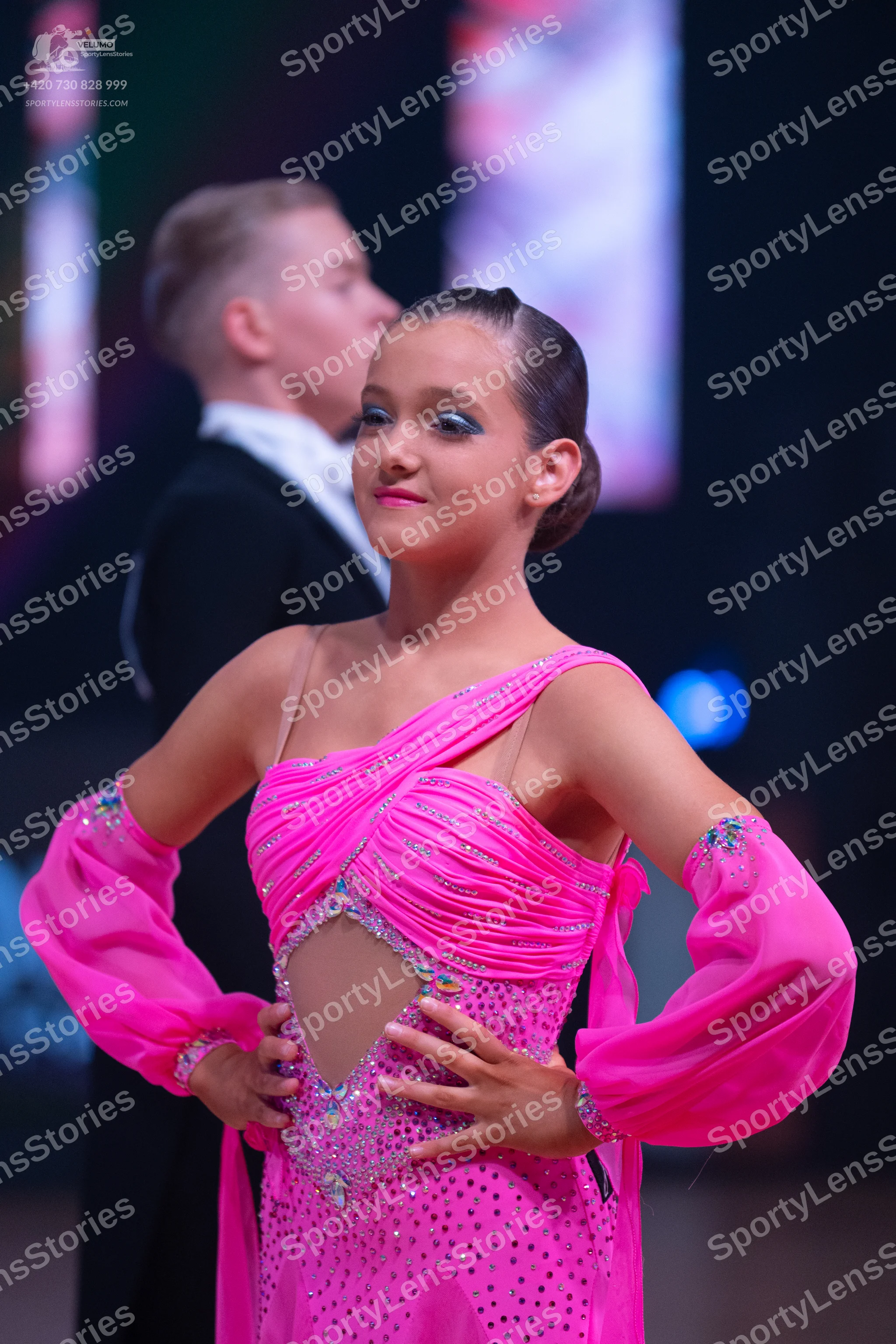 Dancesport competitor: Male dancer: black suit with a white shirt