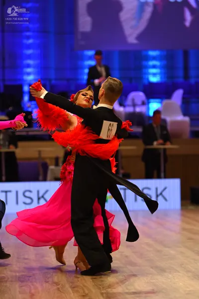 Dancesport competitor: Male dancer: black suit