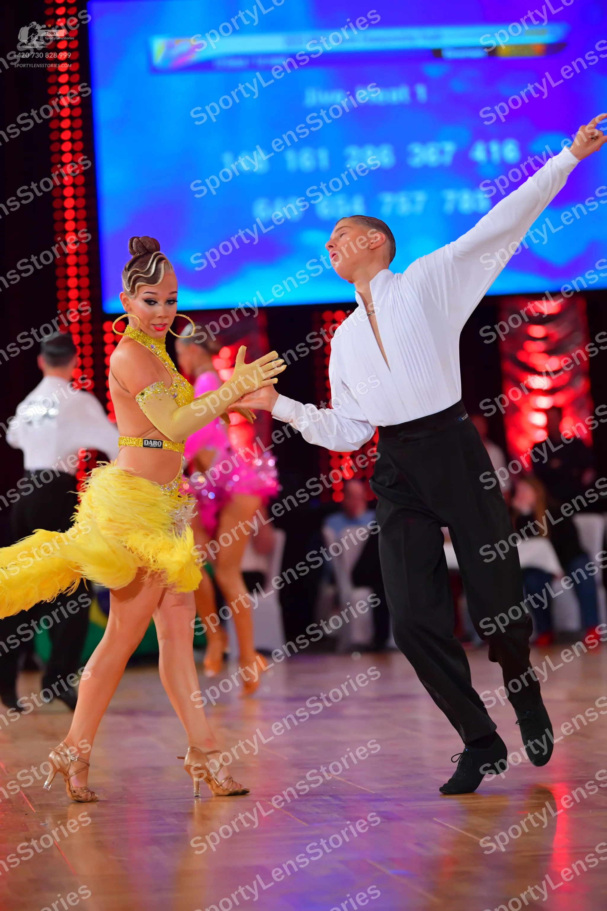 Dancesport competitor: Male dancer: white shirt and black trousers