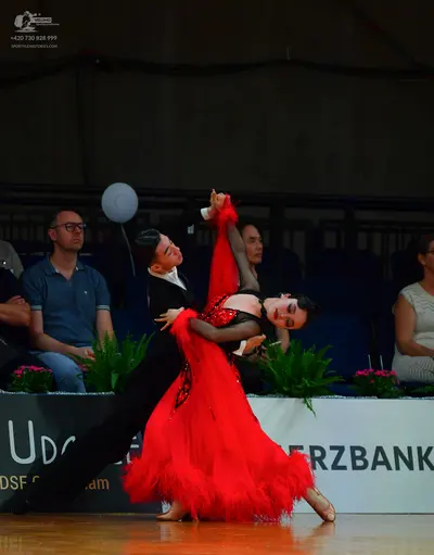 Dancesport competitor: Male dancer: black suit