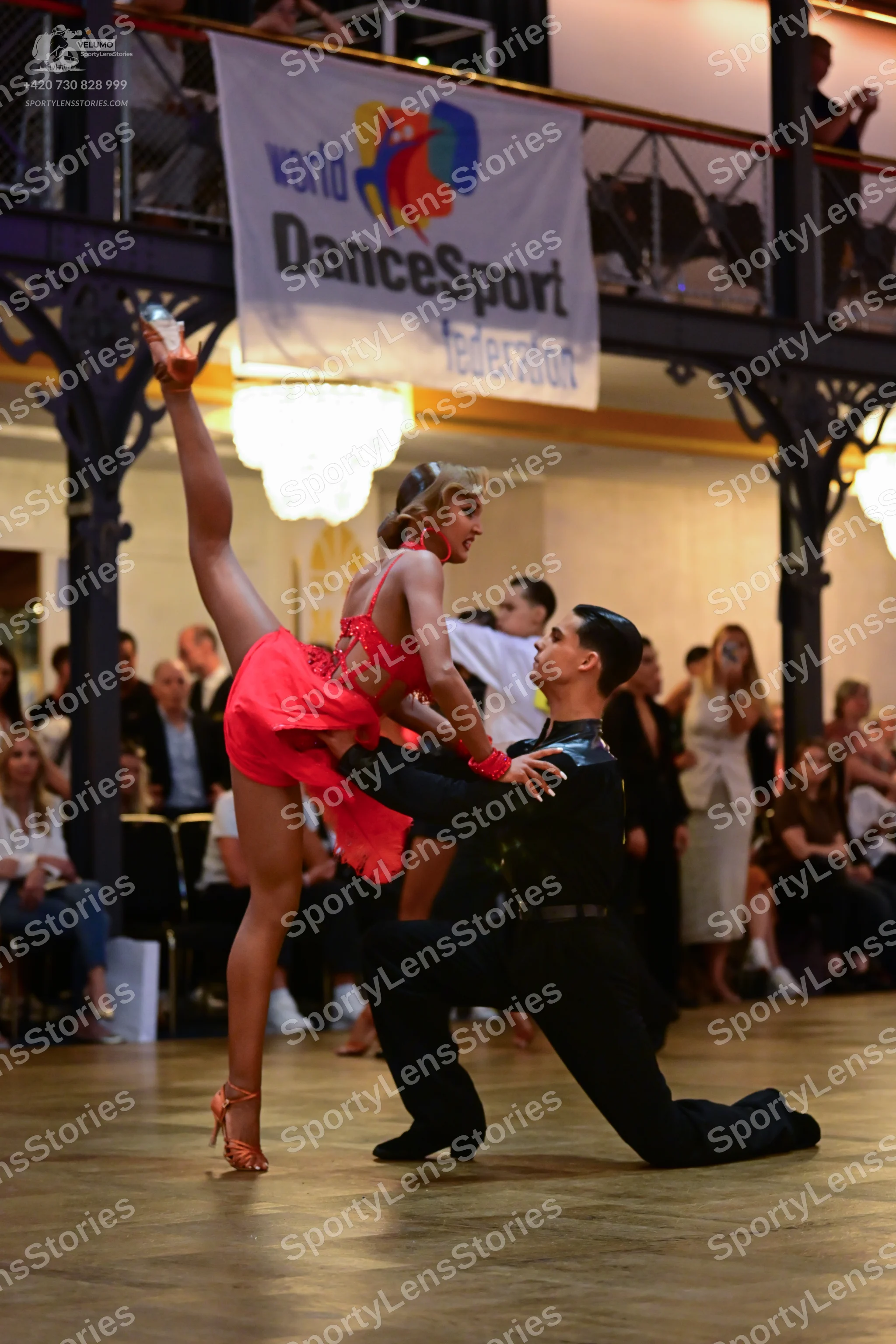 Dancesport competitor: Female dancer: red latin dress
