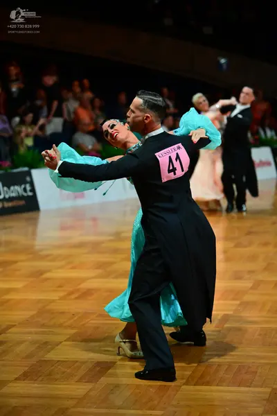 Dancesport competitor #41: Male dancer: black tailcoat with white shirt collar