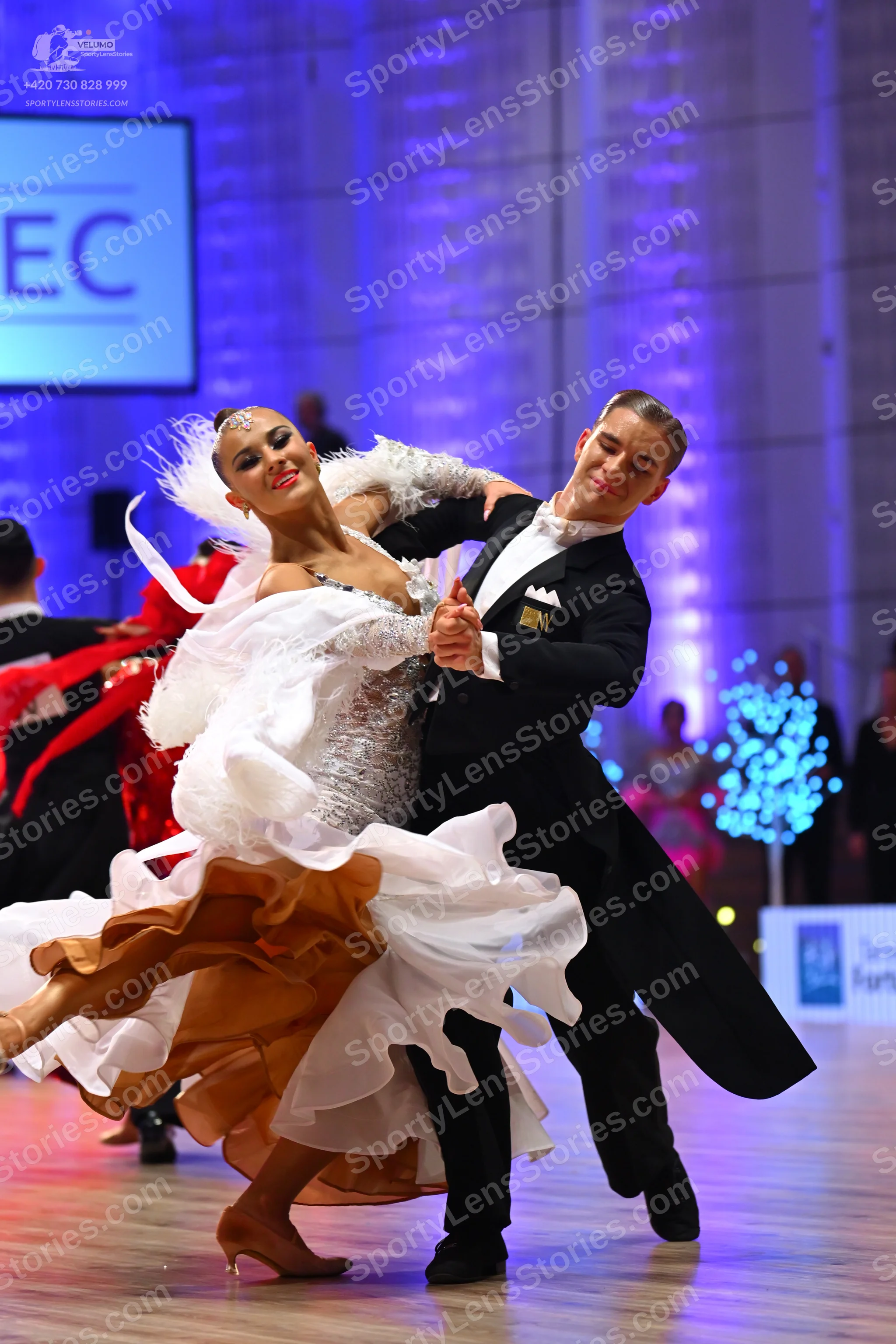 Dancesport competitor: Male dancer: black tailcoat suit with a white shirt and black bowtie