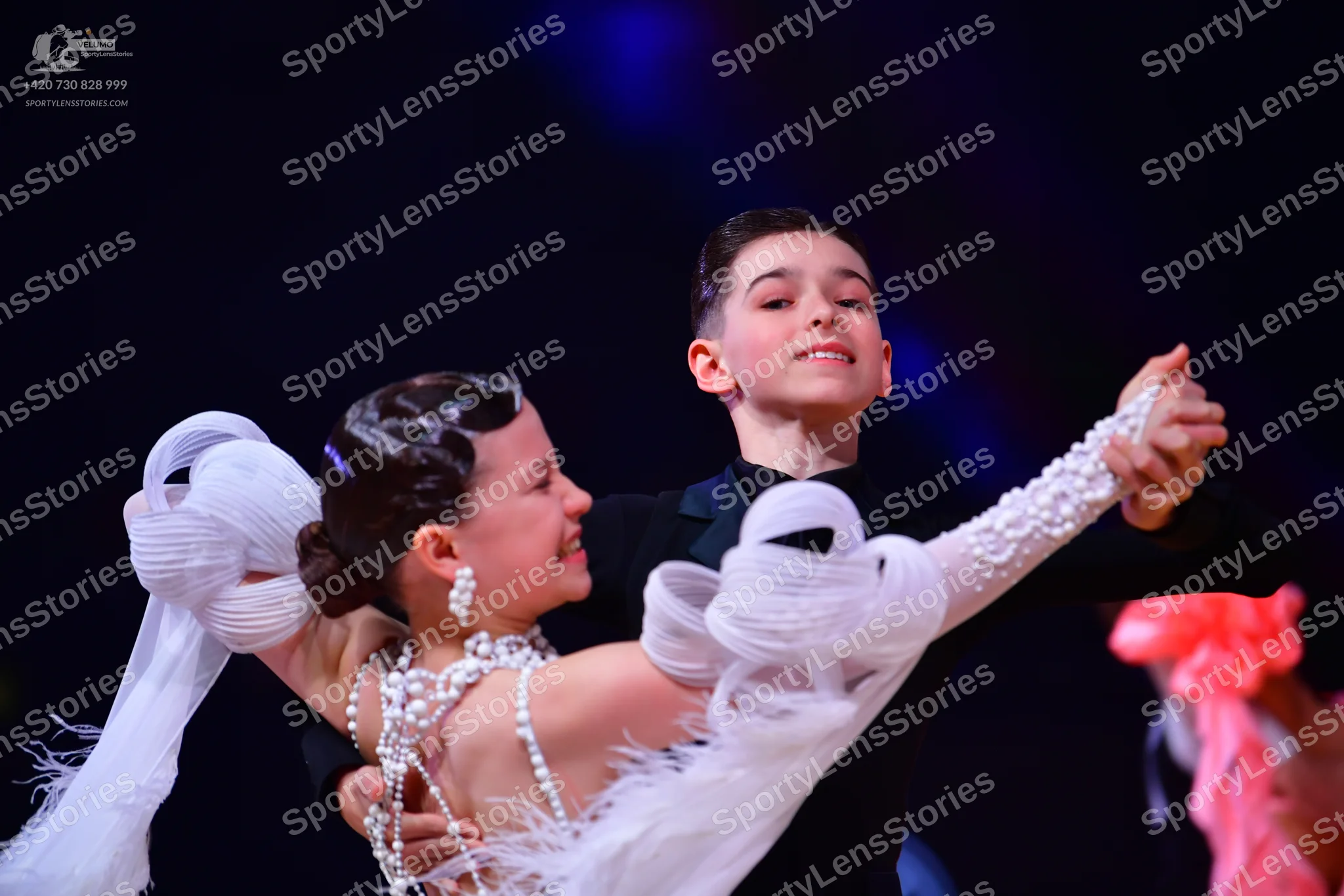 Dancesport competitor: Male dancer: black suit