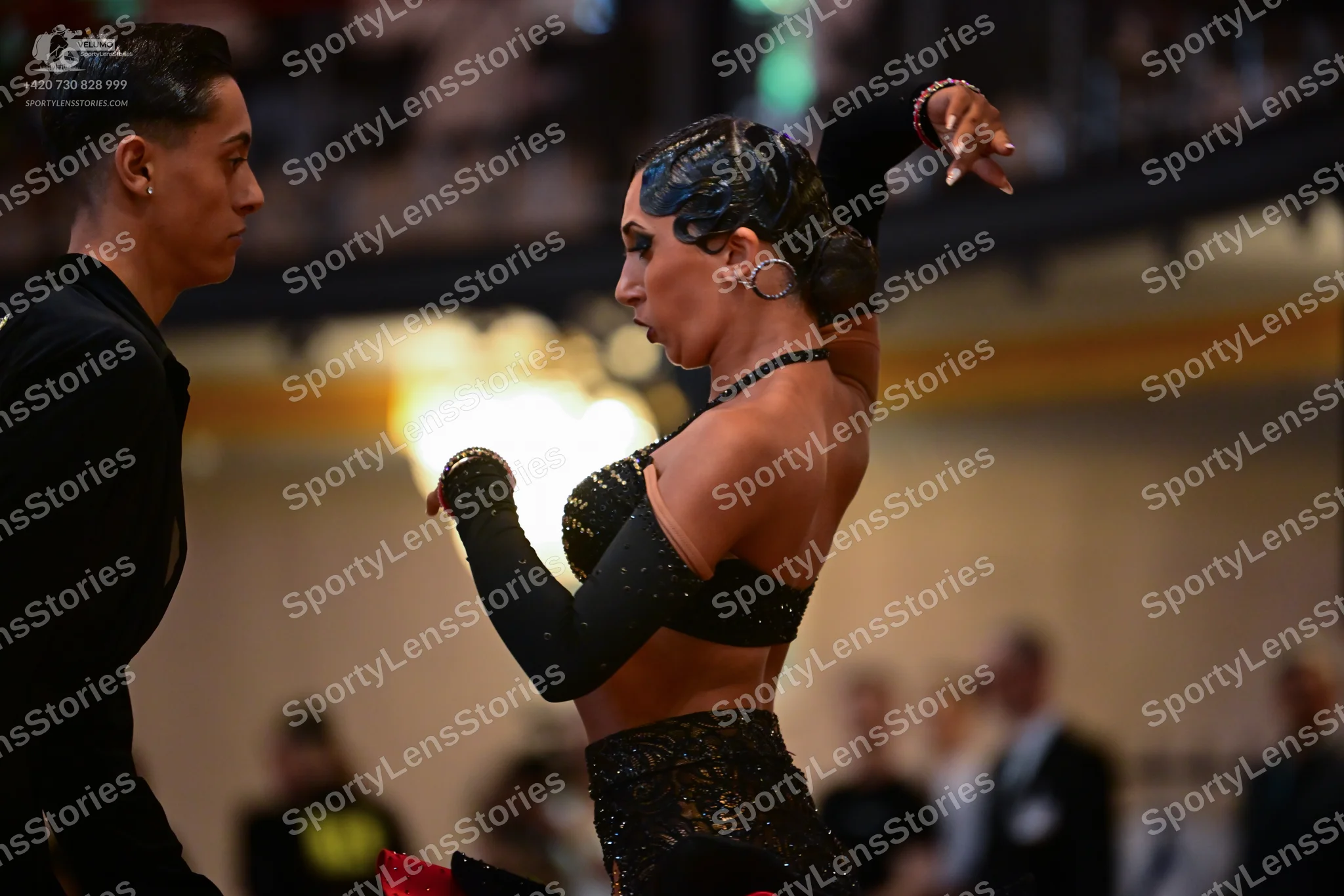 Dancesport competitor: Male dancer: black long-sleeved shirt