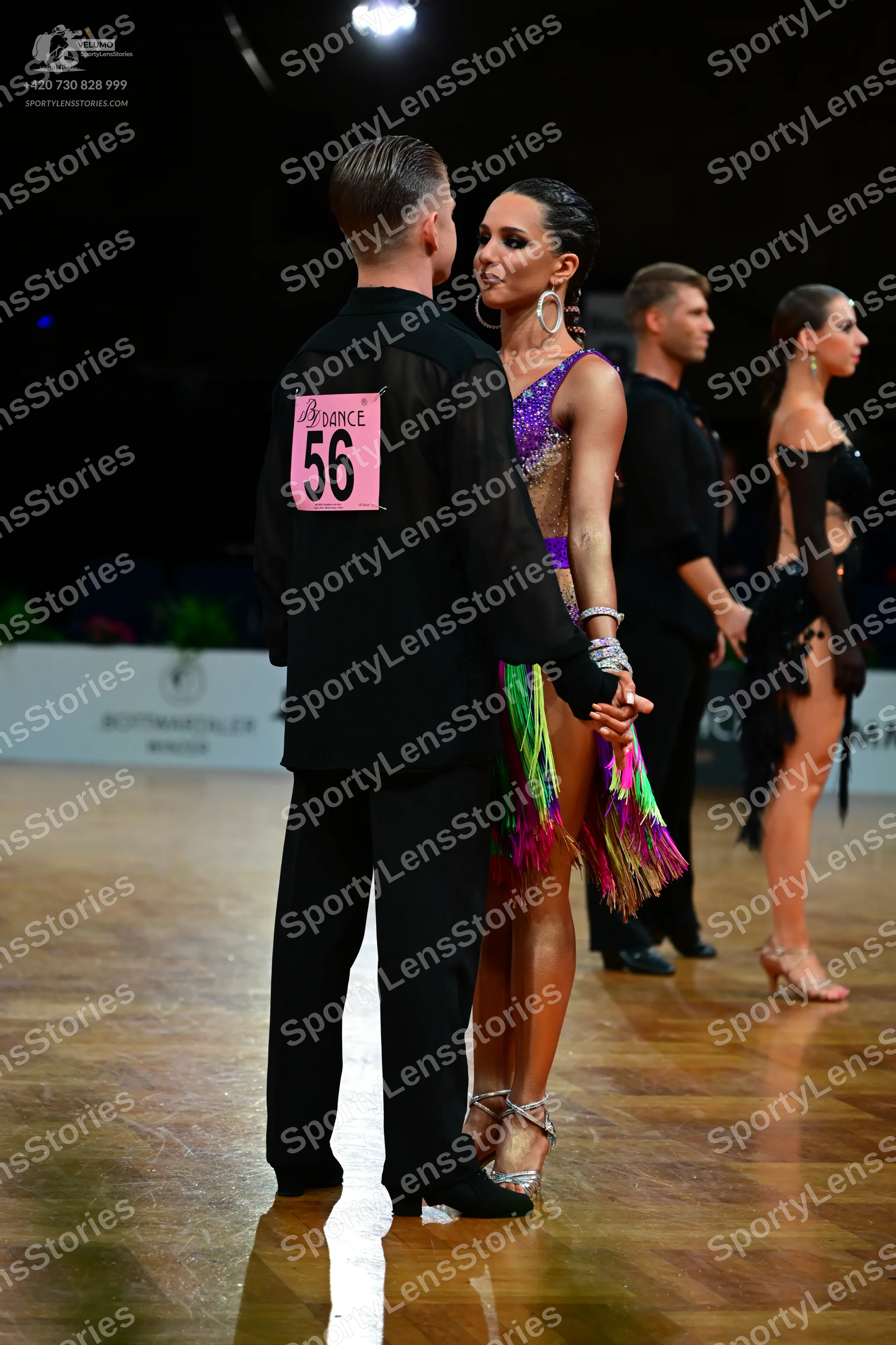 Dancesport competitor #56: Male dancer 1: black long-sleeved shirt and black trousers