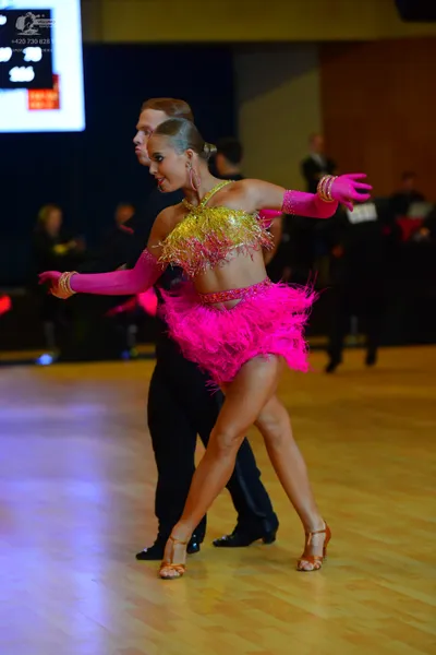 Dancesport competitor: Male dancer: black suit