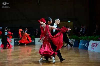 Dancesport competitor #101: Male dancer (left): black suit