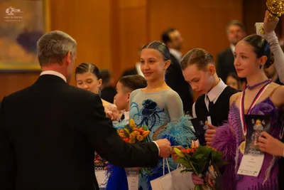 Dancesport competitor: Male dancer: black suit jacket