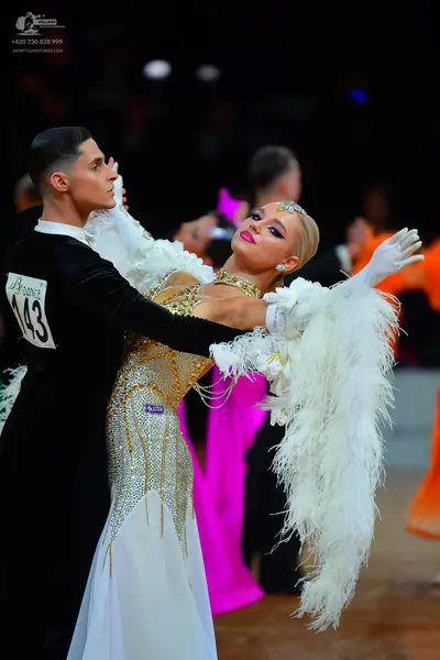Dancesport competitor #143: Male dancer: black suit