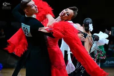 Dancesport competitor #99: Male dancer: black suit