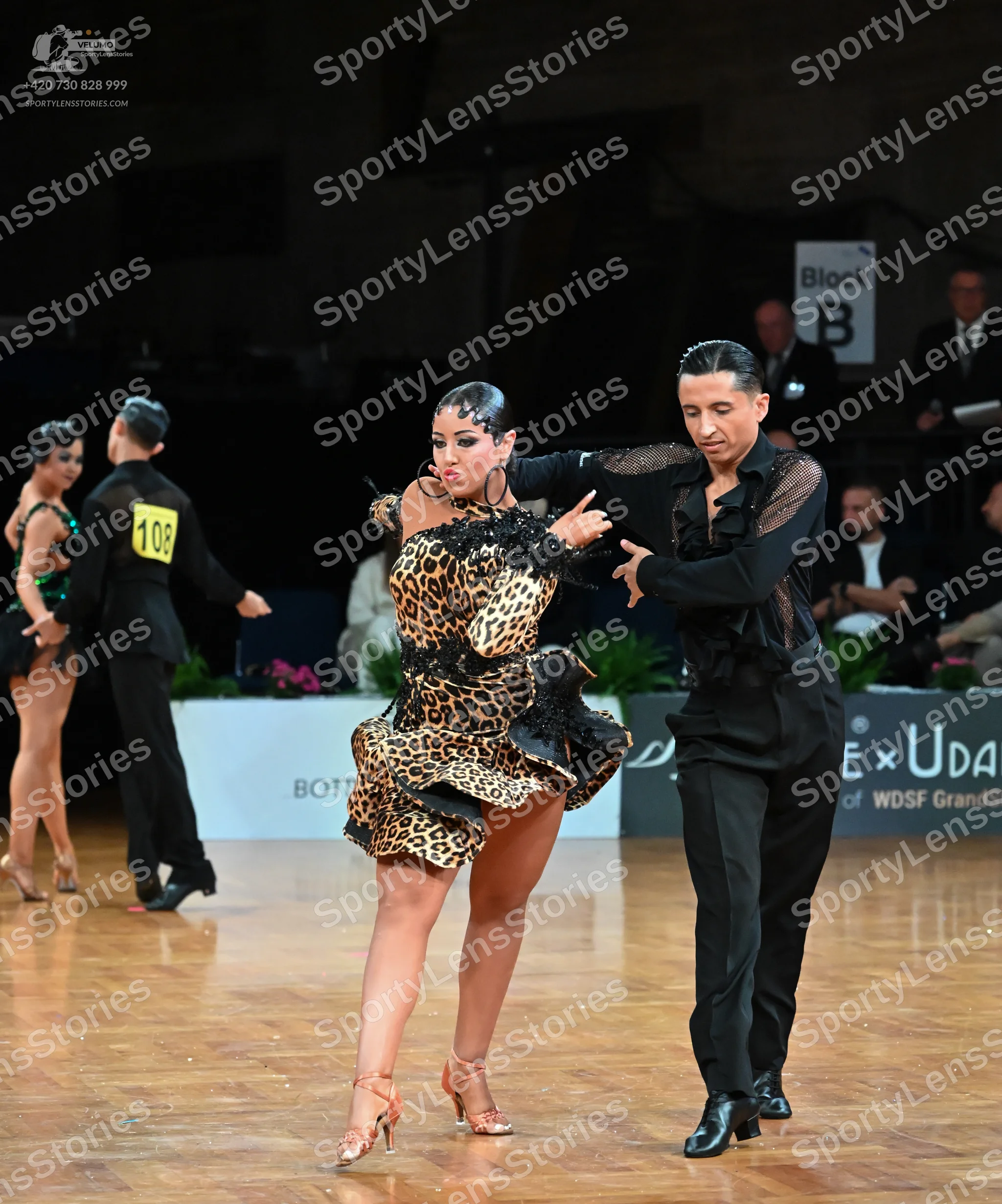Dancesport competitor #108: Female dancer (foreground): leopard print latin dress