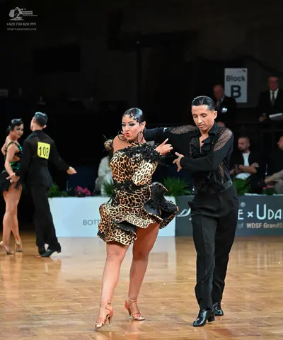 Dancesport competitor #108: Female dancer (foreground): leopard print latin dress