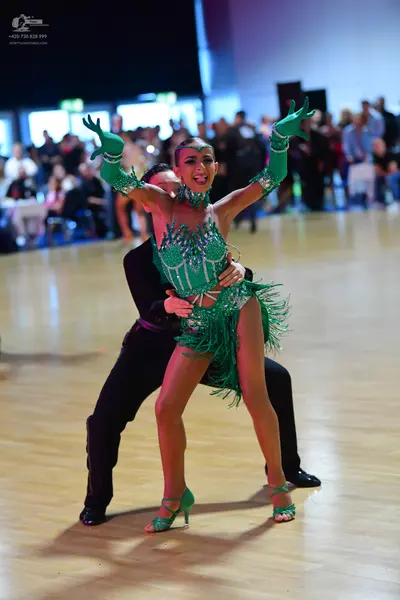Dancesport competitor: Male dancer: black suit