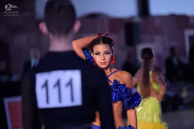 Dancesport competitor #111: Male dancer: black long-sleeved top