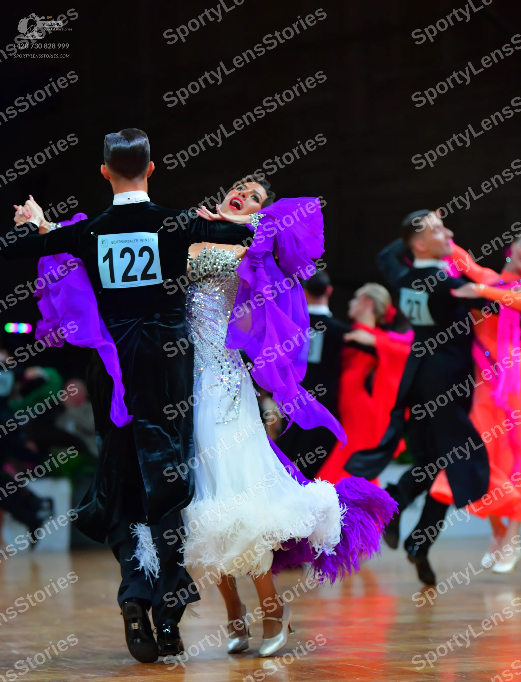 Dancesport competitor #122, #27: Male dancer 1: black suit