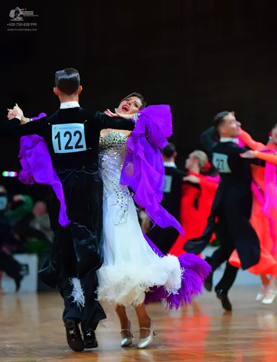 Dancesport competitor #122, #27: Male dancer 1: black suit