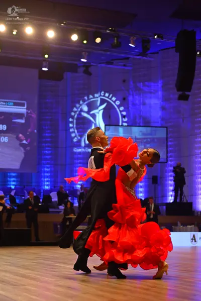 Dancesport competitor: Male dancer: black suit
