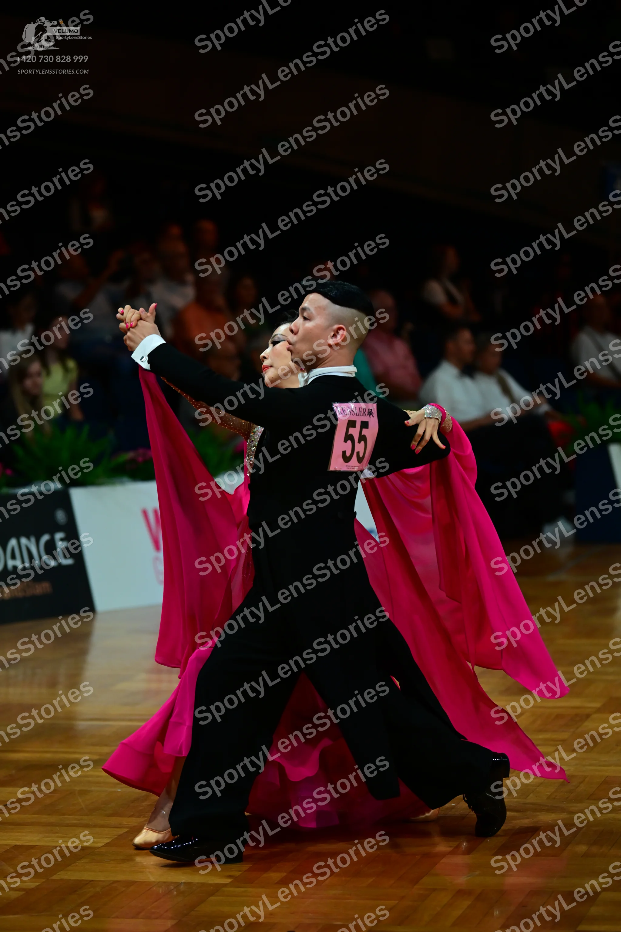 Dancesport competitor #55: Male dancer: black suit with a white shirt