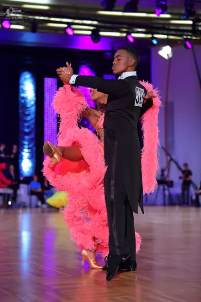Dancesport competitor #52: Male dancer: black tailcoat, white shirt, and black trousers