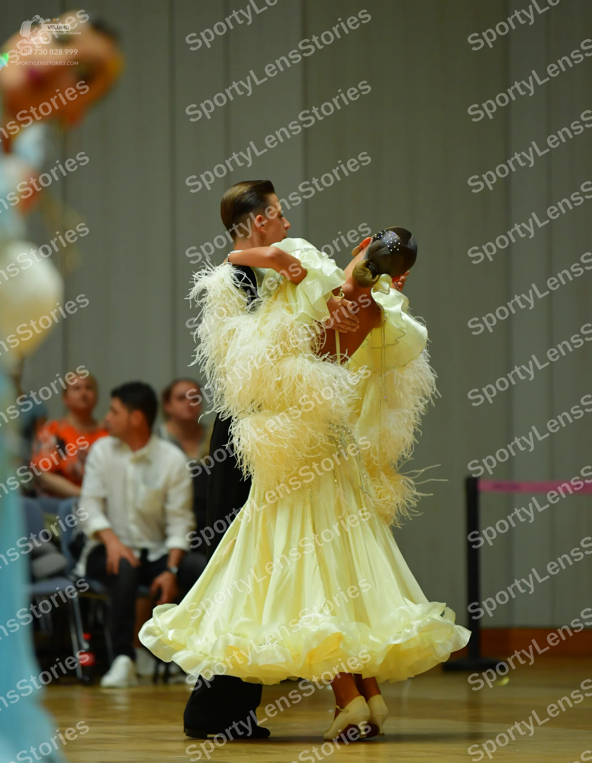 Dancesport competitor: Male dancer: black suit