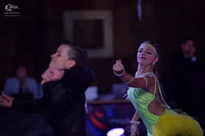 Dancesport competitor: Male dancer: black suit