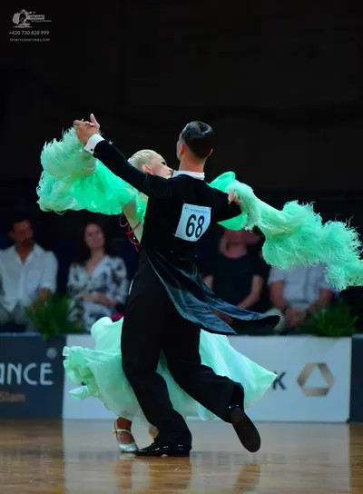 Dancesport competitor #68: Male dancer: black suit with a white shirt