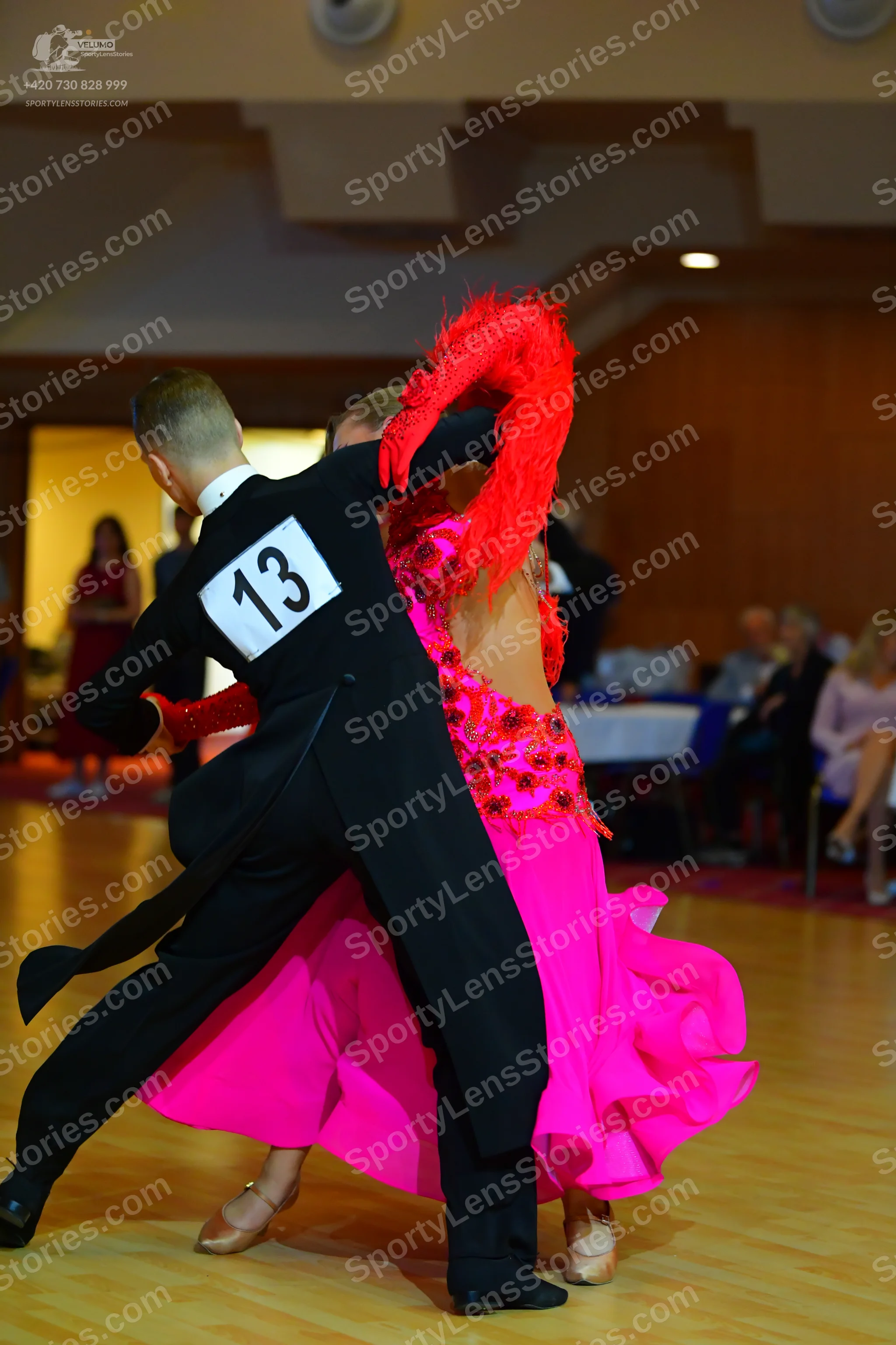 Dancesport competitor #13: Male dancer: black suit with a white shirt