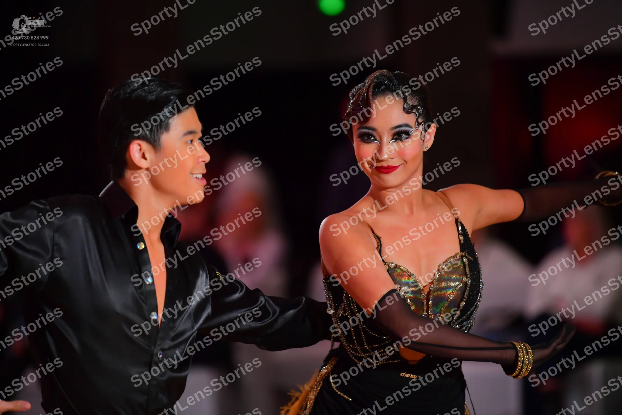 Dancesport competitor: Male dancer: black satin-like long-sleeved shirt