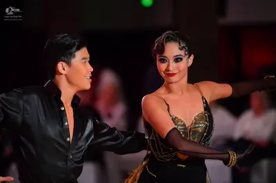 Dancesport competitor: Male dancer: black satin-like long-sleeved shirt