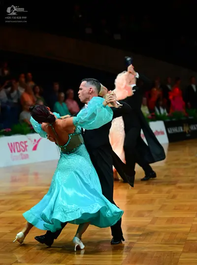 Dancesport competitor: Male dancers: black suits