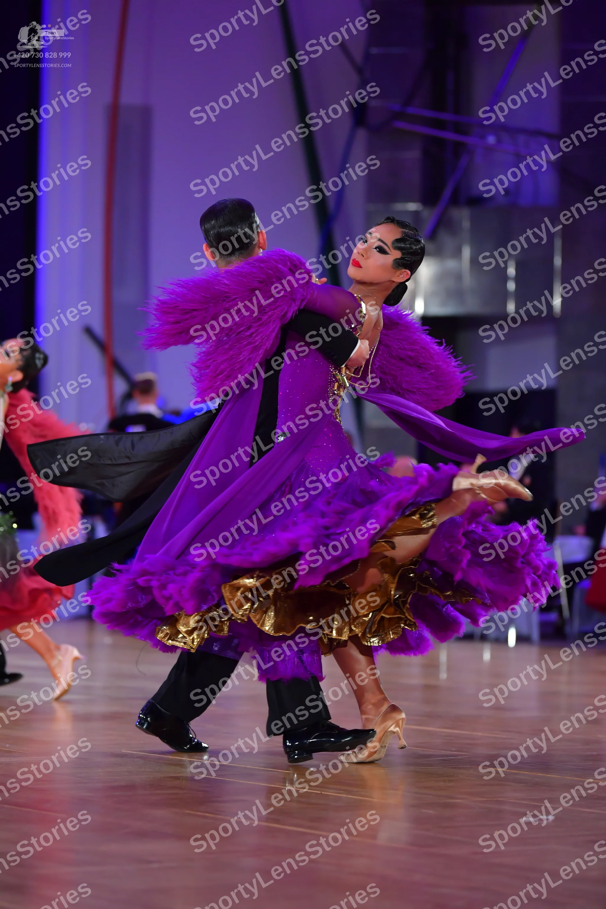 Dancesport competitor: Male dancer: black suit and trousers