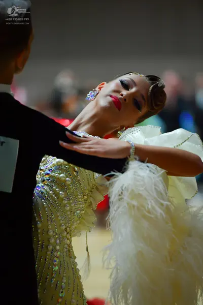 Dancesport competitor: Male dancer: black suit