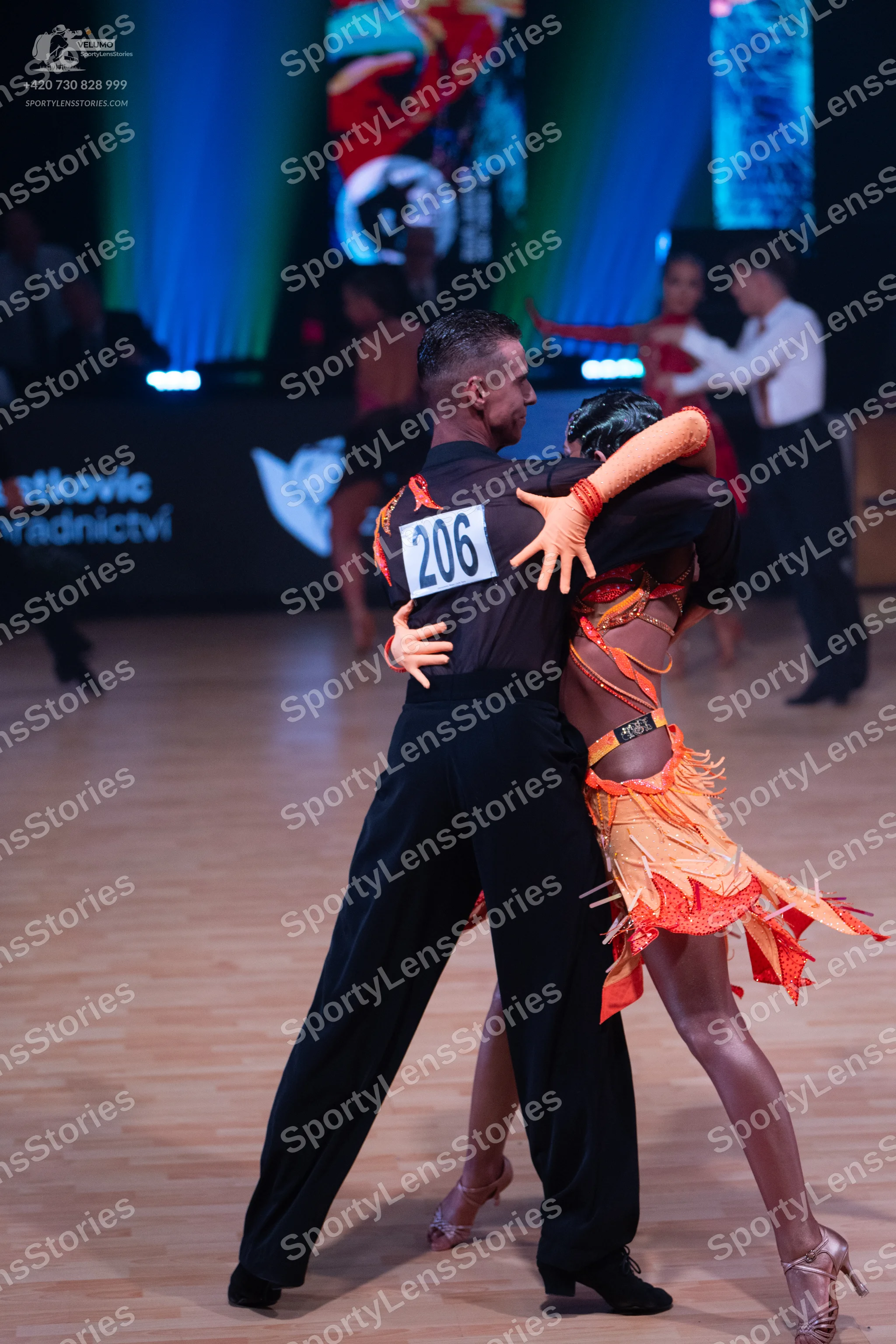 Dancesport competitor: Male dancer: black long-sleeved shirt and black trousers