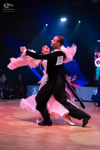 Dancesport competitor: Male dancer: black ballroom tailcoat and trousers