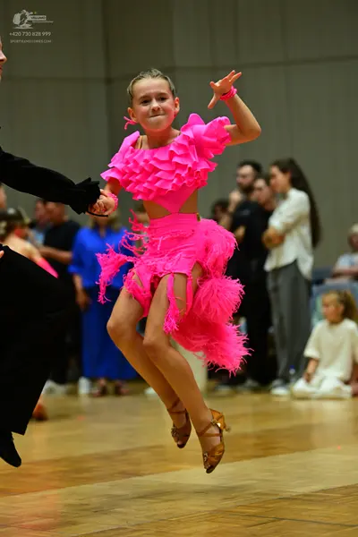 Dancesport competitor: Male dancer: black suit